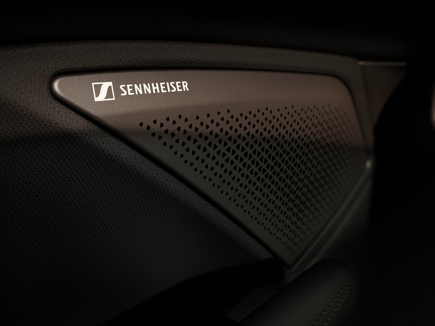  immersive by sennheiser high fidelity 12-speaker audio system in the CUPRA Terramar showcasing the sennheiser logo. Close up view.